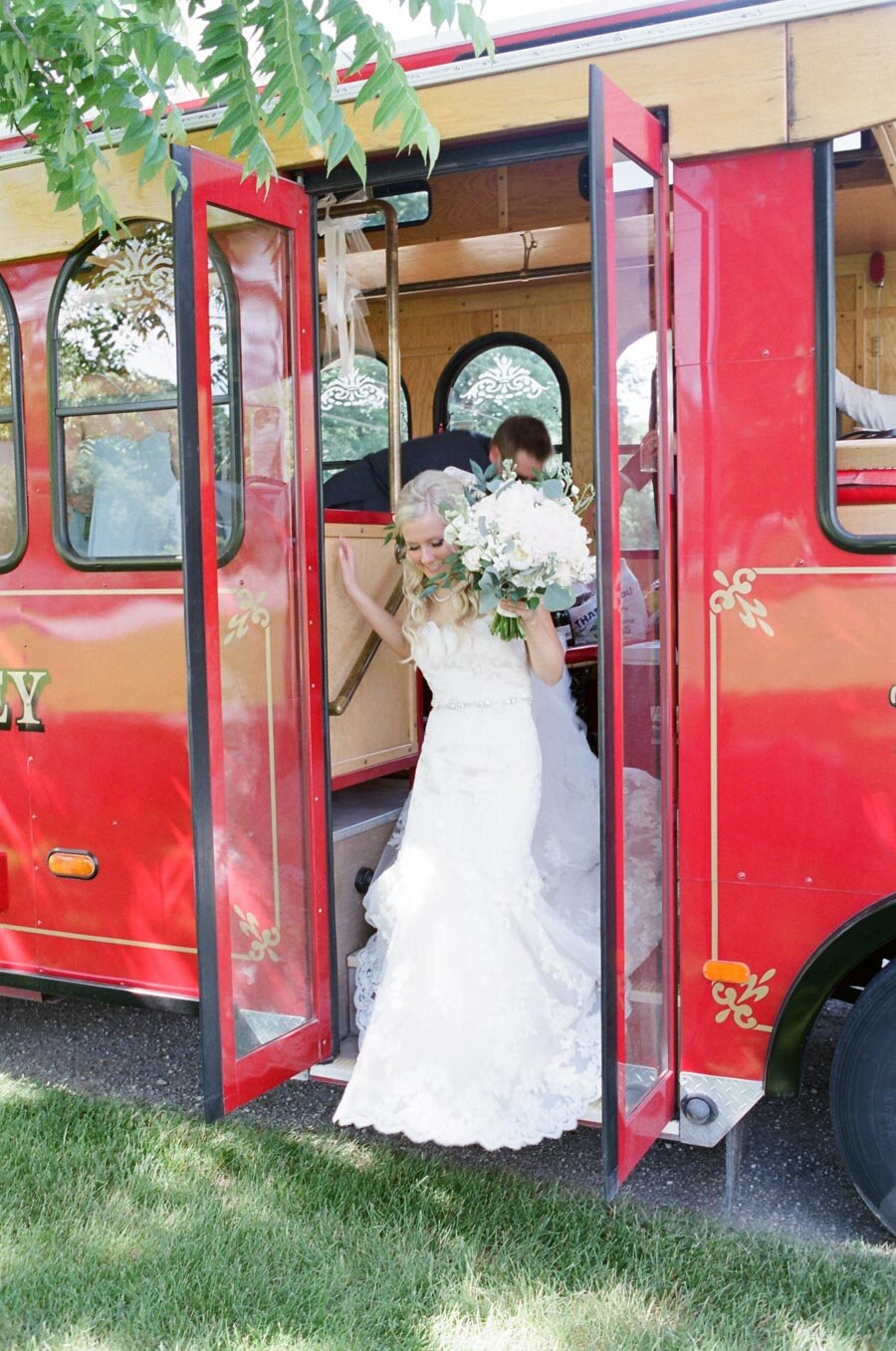 Bride getting off a Door County Trolly