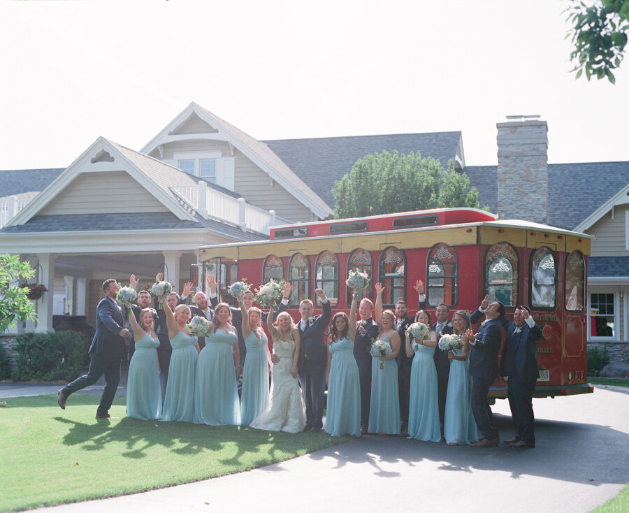 Wedding Party in front of Door County Trolly at Horseshoe Bay Golf Club