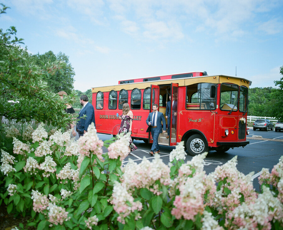 Guests arrive by Door County Trolly at the Horseshoe Bay Beach Club