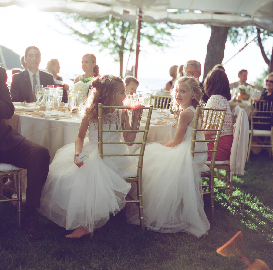 sister bay door county wedding cocktail hour flower girls at reception