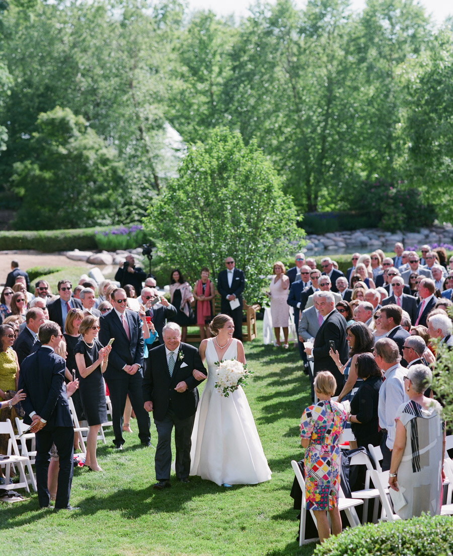 private estate milwaukee wedding father walking bride down aisle