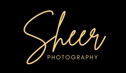 The logo reads Sheer Photography in elegant, cursive gold lettering on a black background.