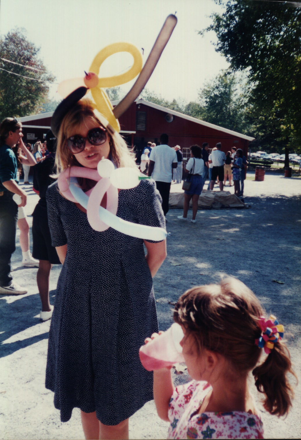Sam has a very important job, but she is not above wearing a well-executed balloon accessory. Or two.