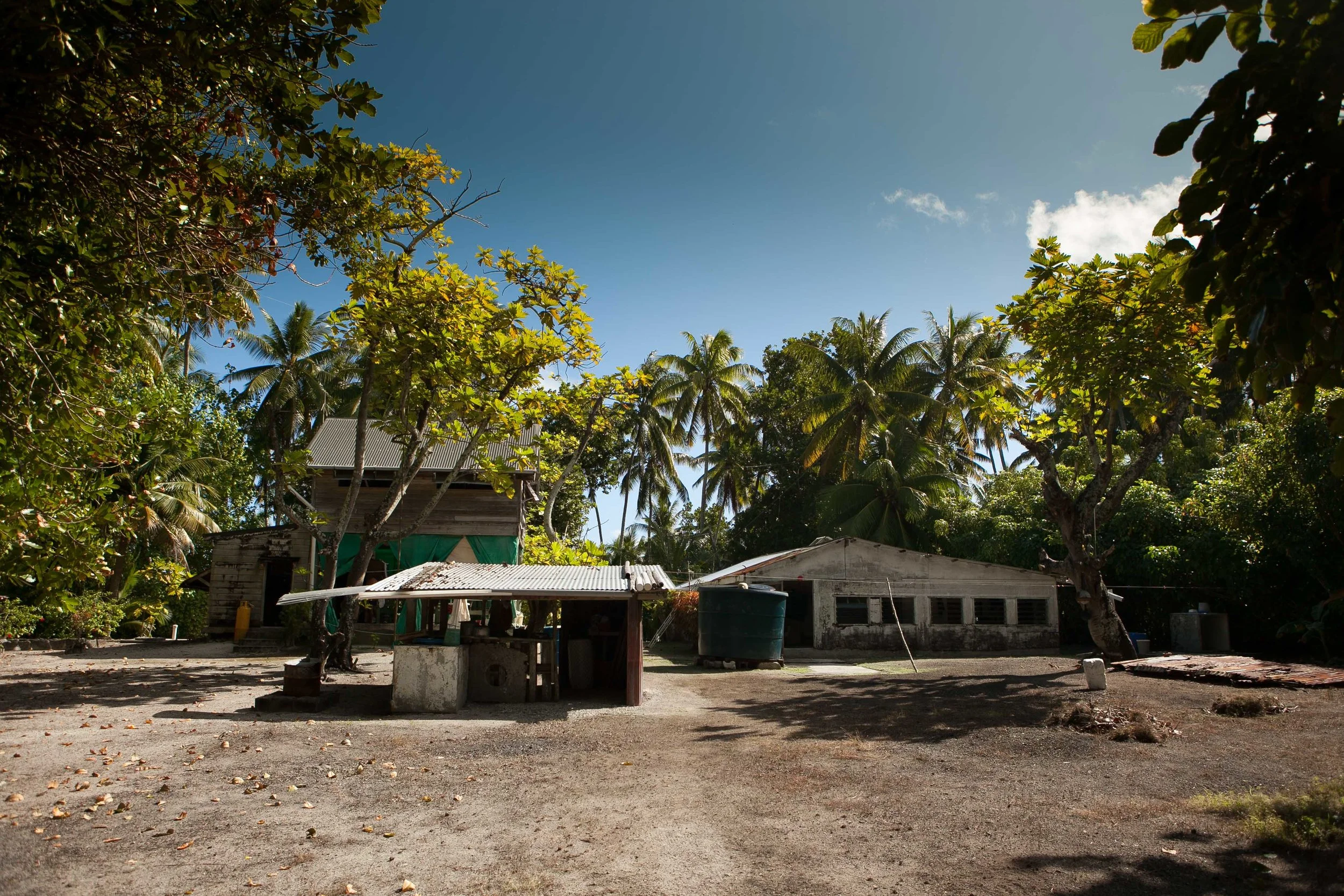 The original house on the right, Tom Neal's former residence, with the ranger's building to the left. Suwarrow, Cook Islands.
