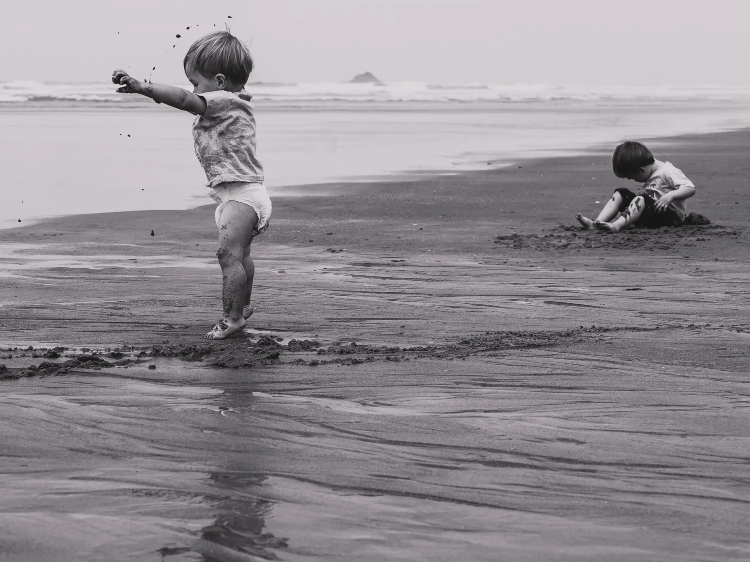 Playing with Sand - Oregon Coast