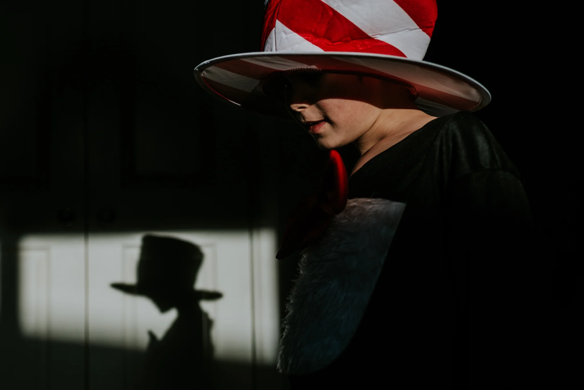 The kids were trying on their costumes for book week when I noticed the cool shadow in the back ground. I played around so I good a nice balance. Balancing with the shadow.