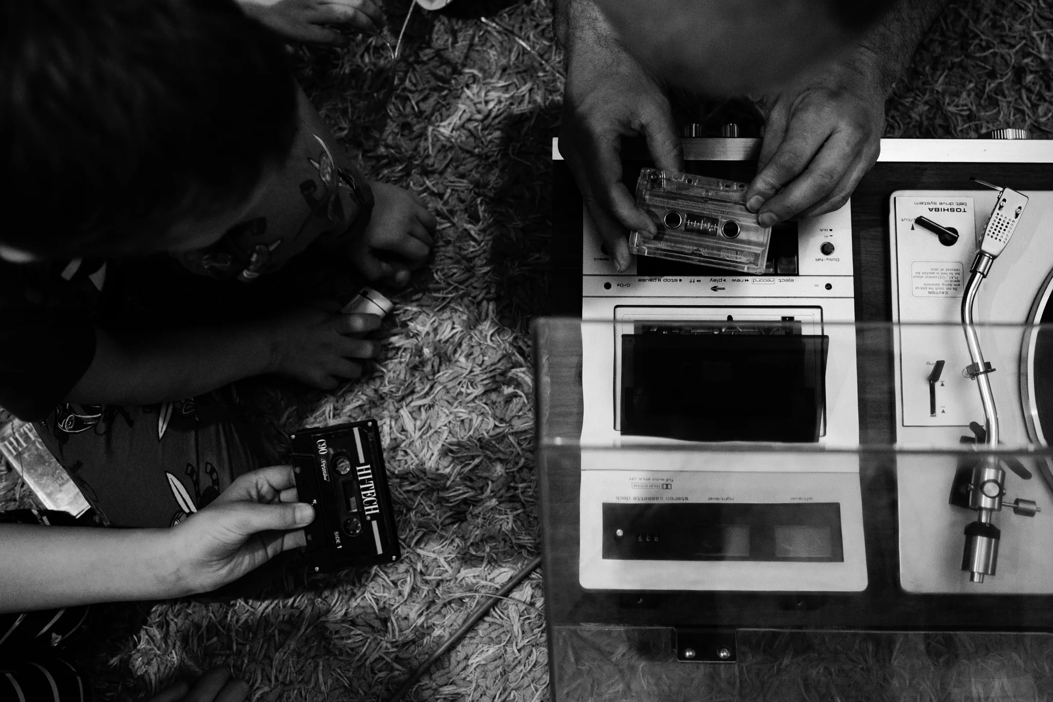 This was such a cute moment, my husband showing the kids how we used to record music. I was trying to balance with the two tapes in the same thirds.