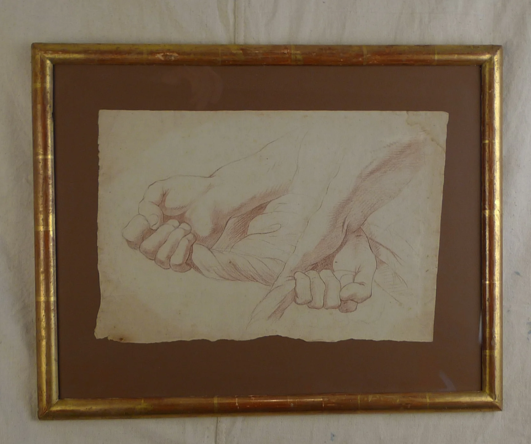  A beautiful 19th c. red chalk study of hands and rope mounted on mat board that blends nicely into the rubbed finish on the 19th c. water-gilded half-round molding. &nbsp;Some staining, foxed and uneven&nbsp;edges.  Measures 21" w x 16 1/2" h  $800 