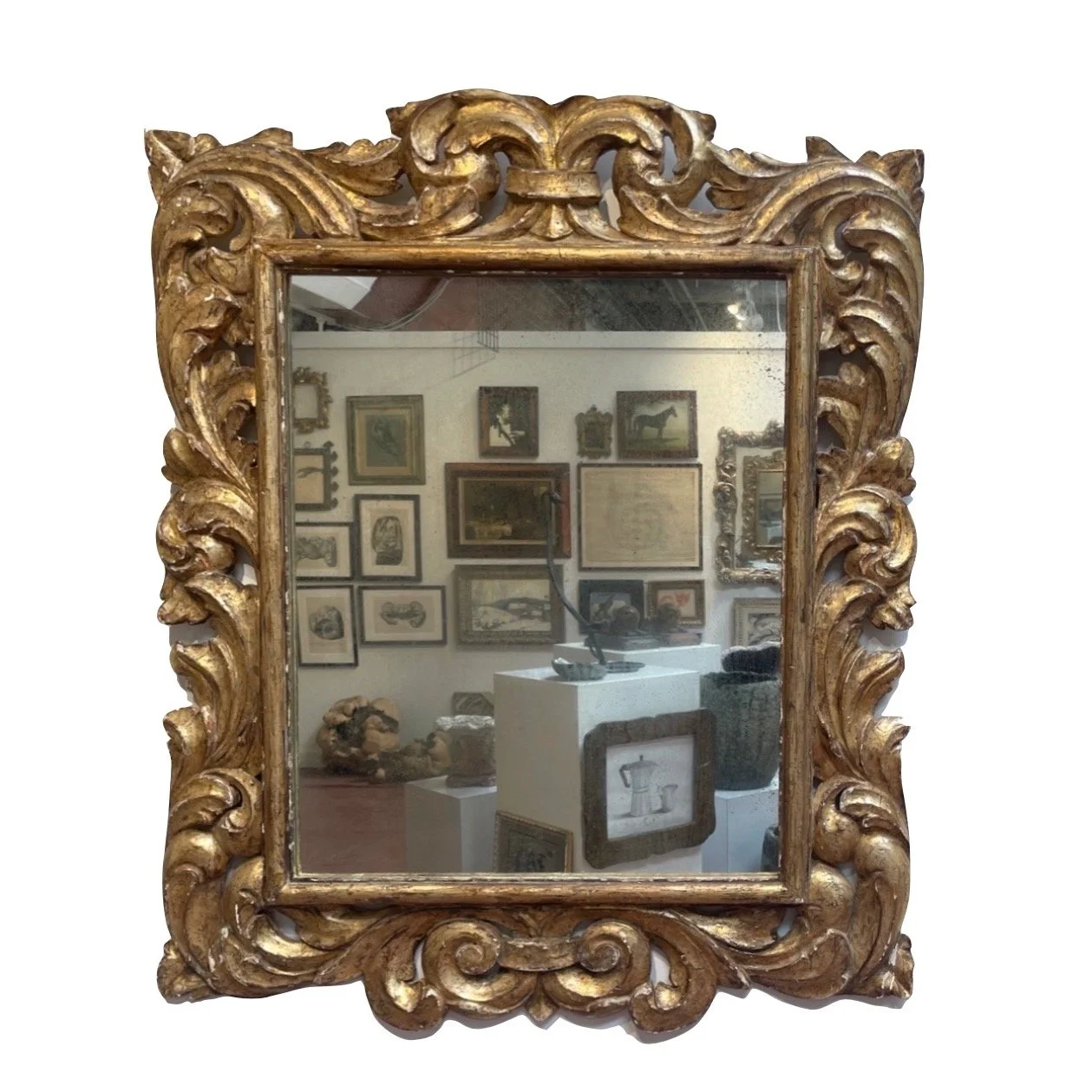  This beautiful and large-scale silver gilt frame ensures that this mirror will be a center point wherever it hangs. It’s big: 45” h x 38.5” w and its handsome orange glow comes from the silver leaf having been coated with gamboge to give the appeara