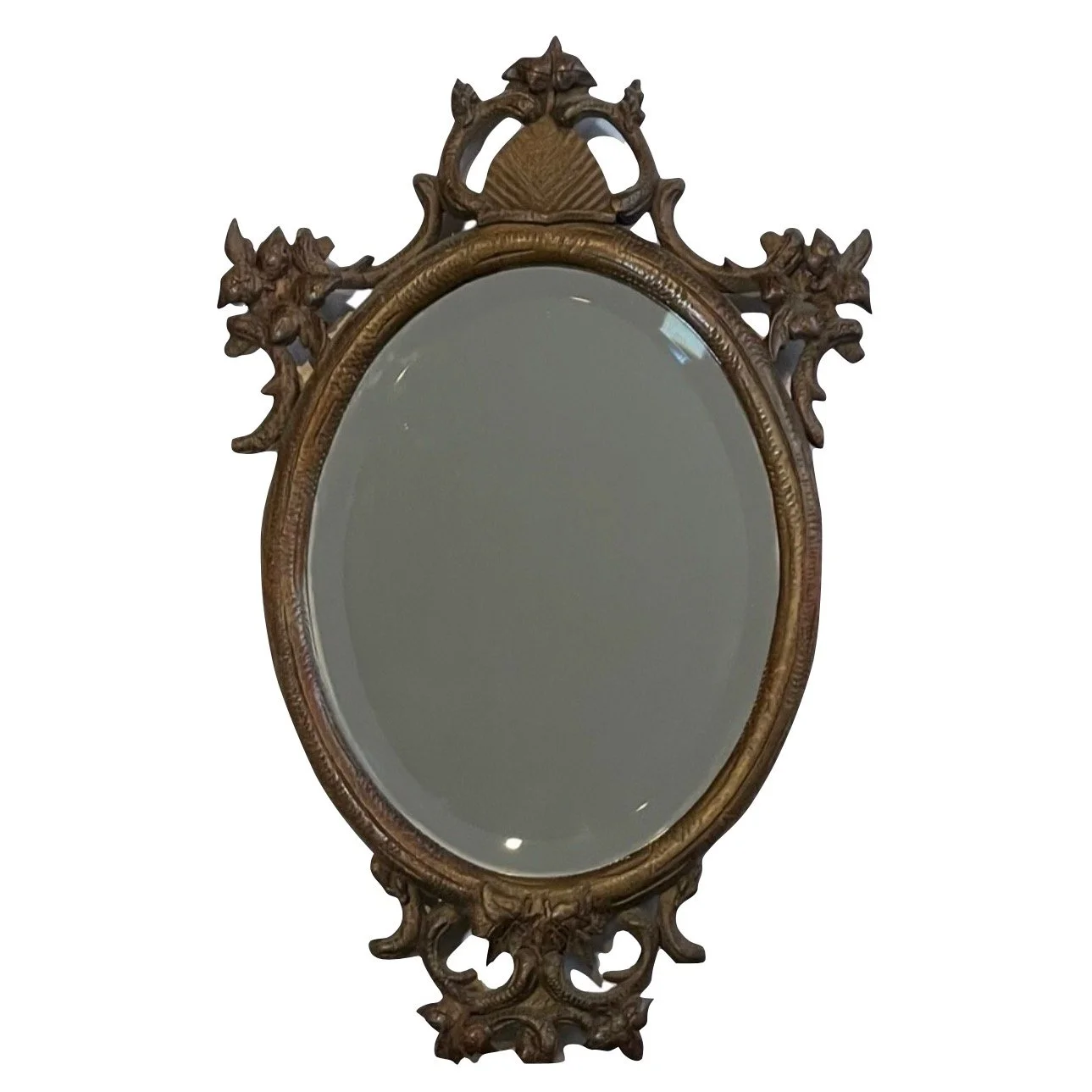  This late 19th c frame has nicely carved elements that feel Chinoiserie and English country at the same time. While the carving is quite nice, I especially love the razzle of the chisel patterns walked all around the oval. A lovely piece whose faux 