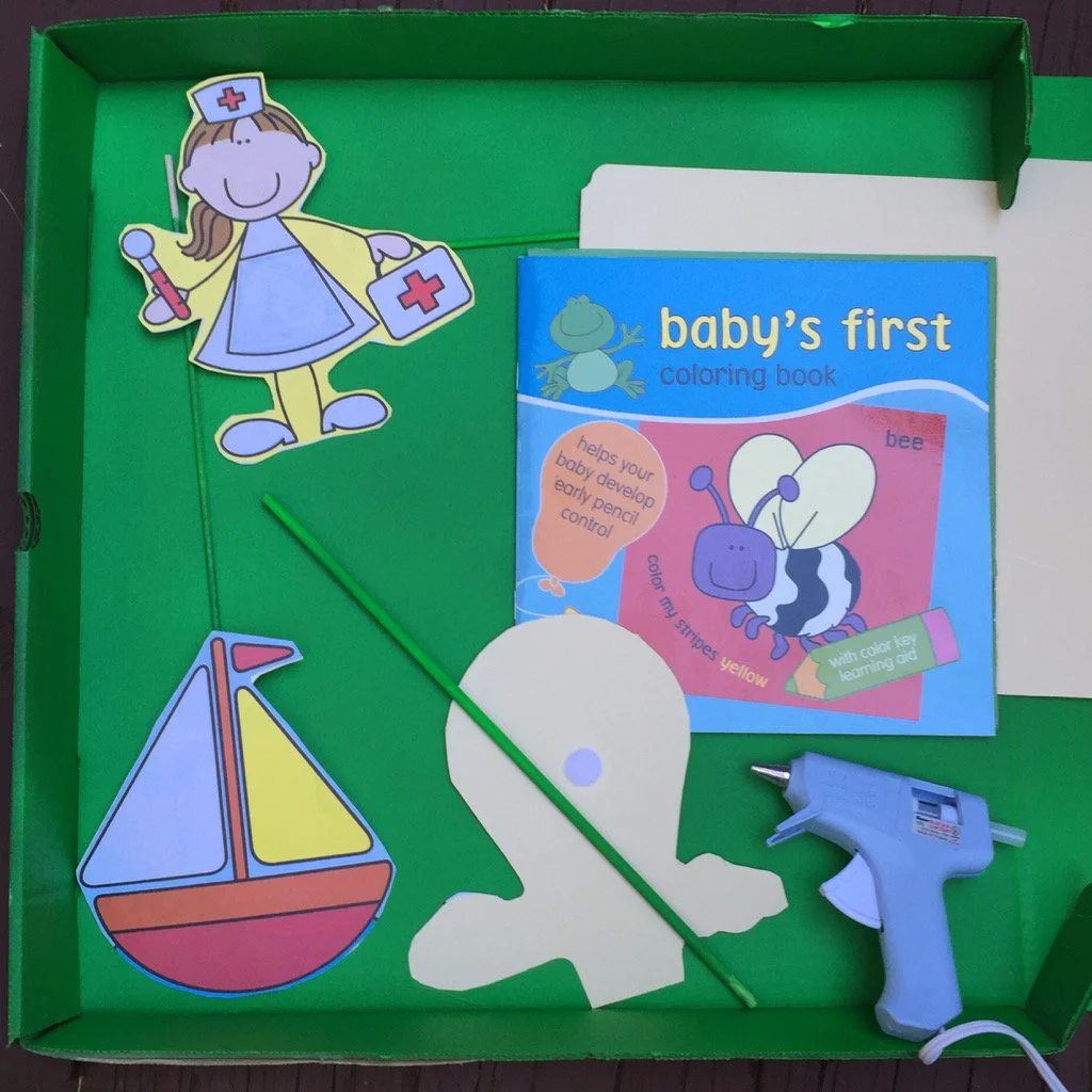 Coloring books provide great movie "props." Mount art on cardboard or folder to strengthen.
