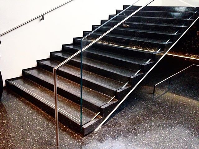 It's a simple stair mostly designed by #mariobastianellidontdoinstagram steel, terrazzo, glass. A calm moment #yournewMoMA