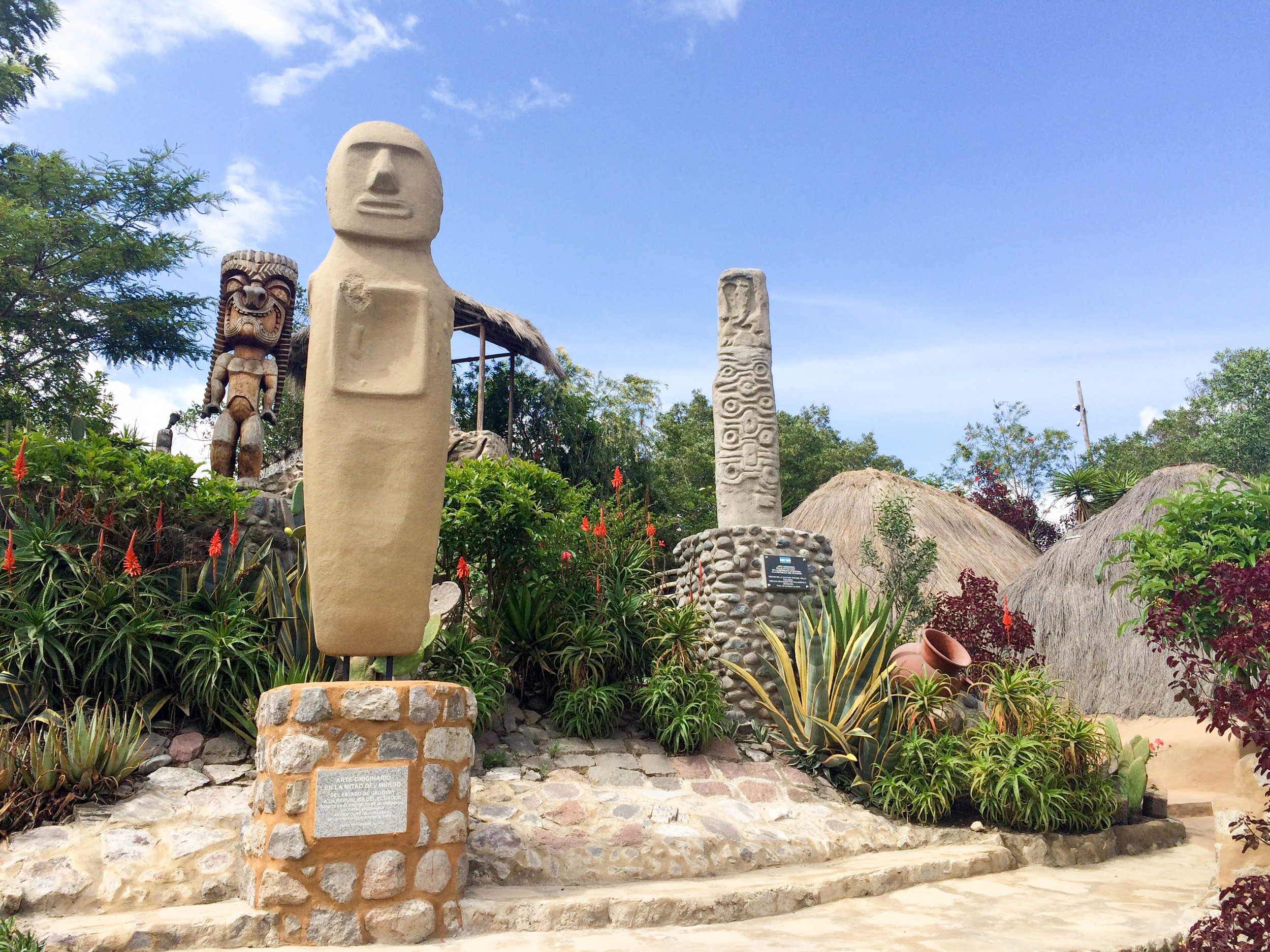 Sculptures and Flowers at Intiñan Museum, Ecuador