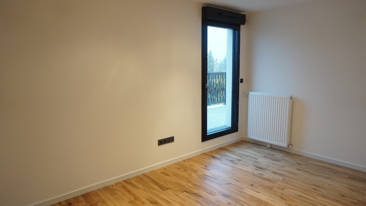 Chambre avec parquet massif en chêne