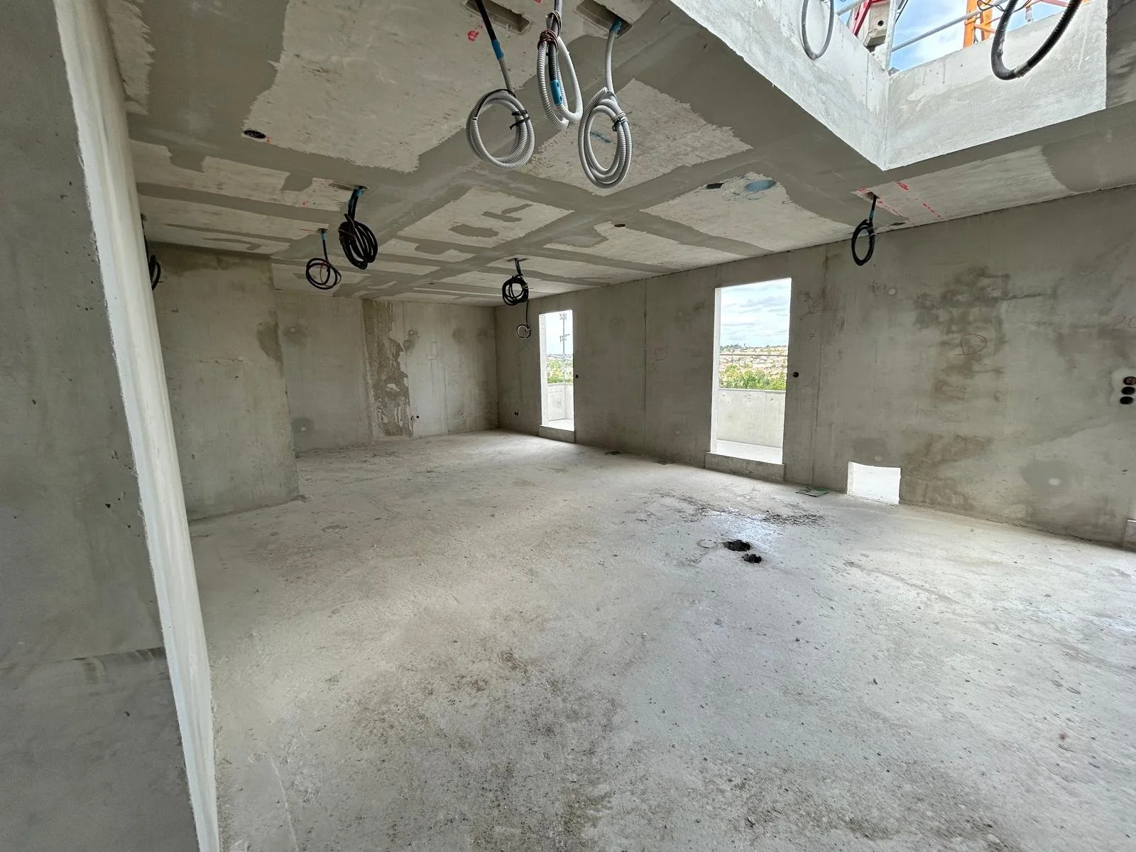 Aperçu intérieur logement avec accès rooftop