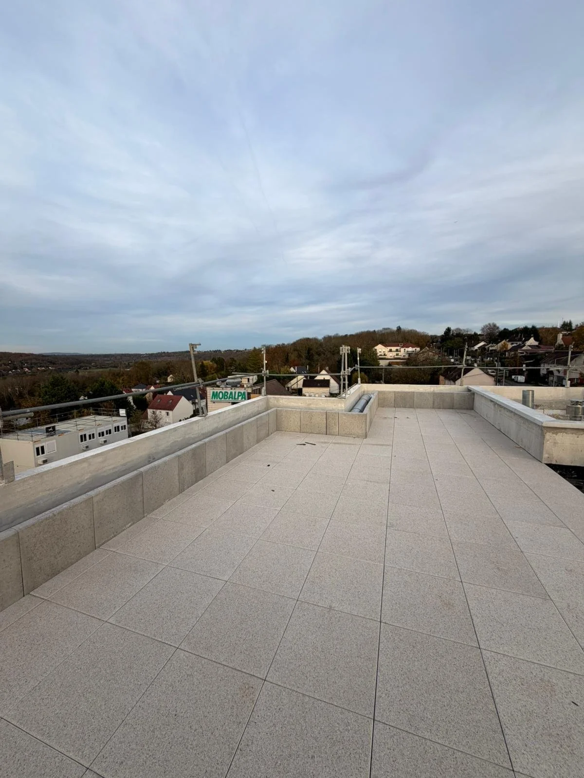 Pose des dalles sur plot des rooftops