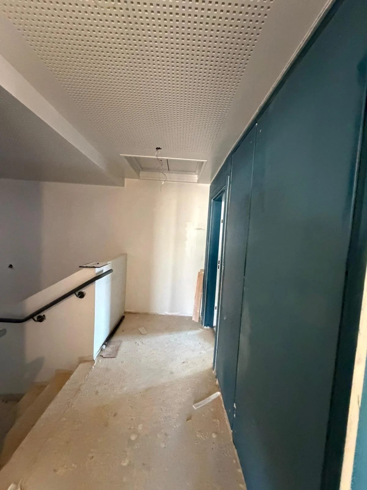 Première couche de peinture des parties communes