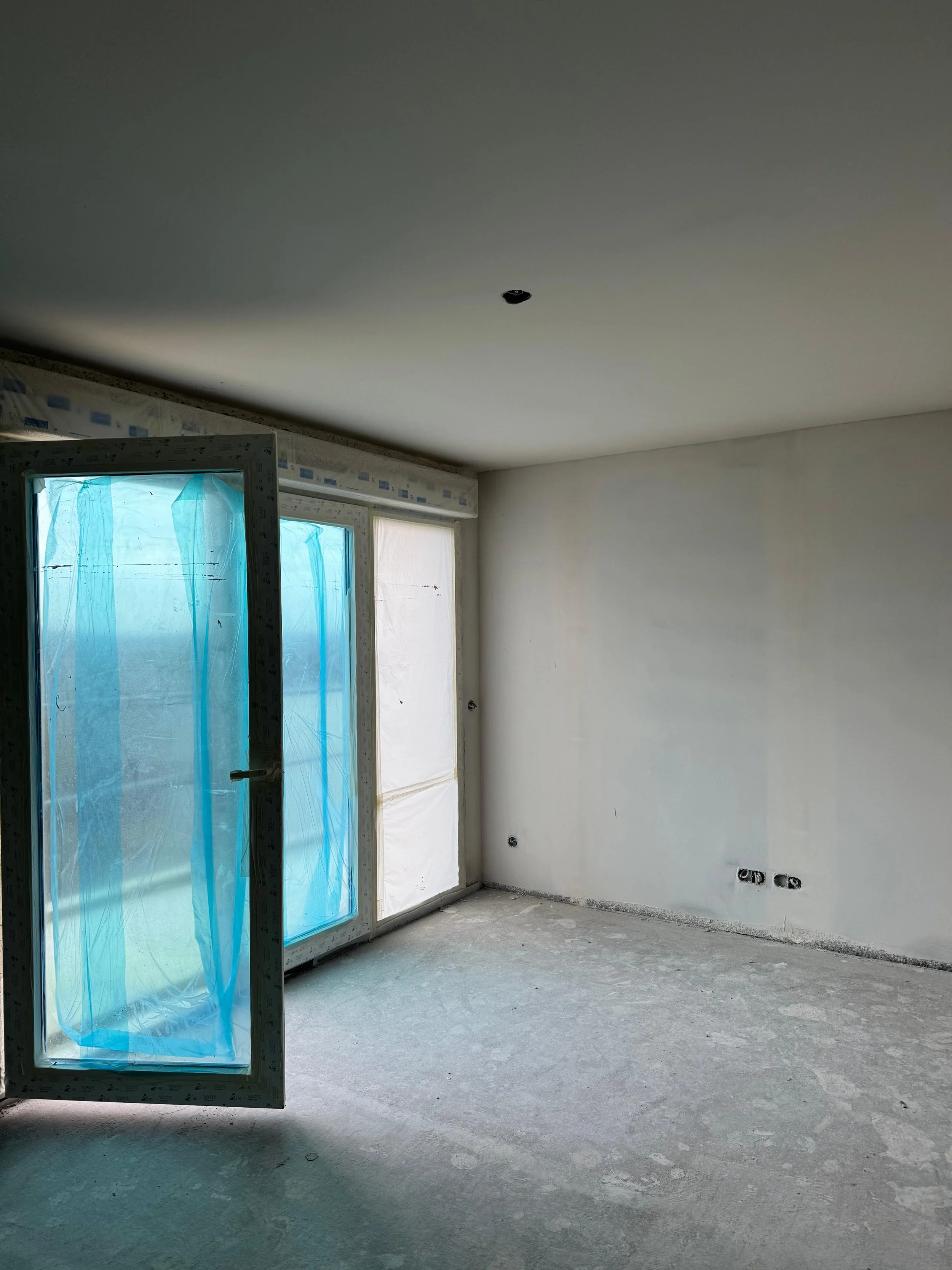 Première couche d'enduit