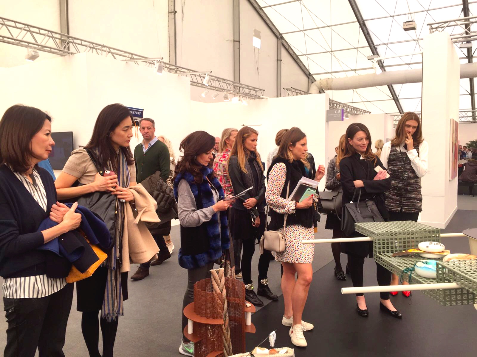 Copy of ArtSocial Club members exploring the assemblage of Helen Marten, a 2016 Turner Prize nominee, at Frieze Art Fair 2016. 