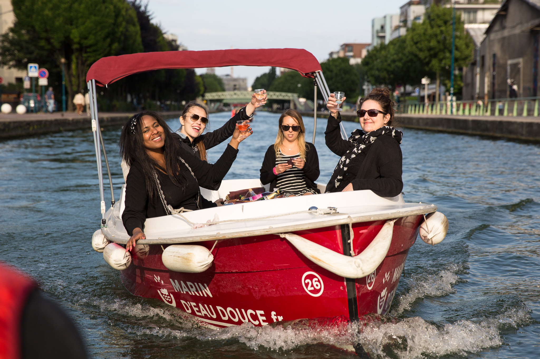 criteo employees on boats at team building event at bassin de la