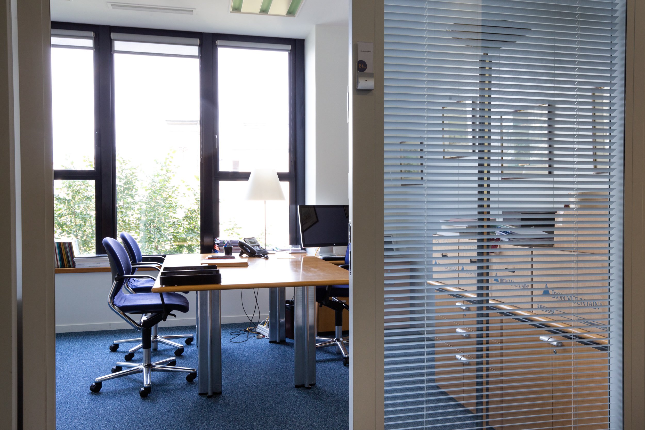  office-section-composition-with-blinds-and-chairs 