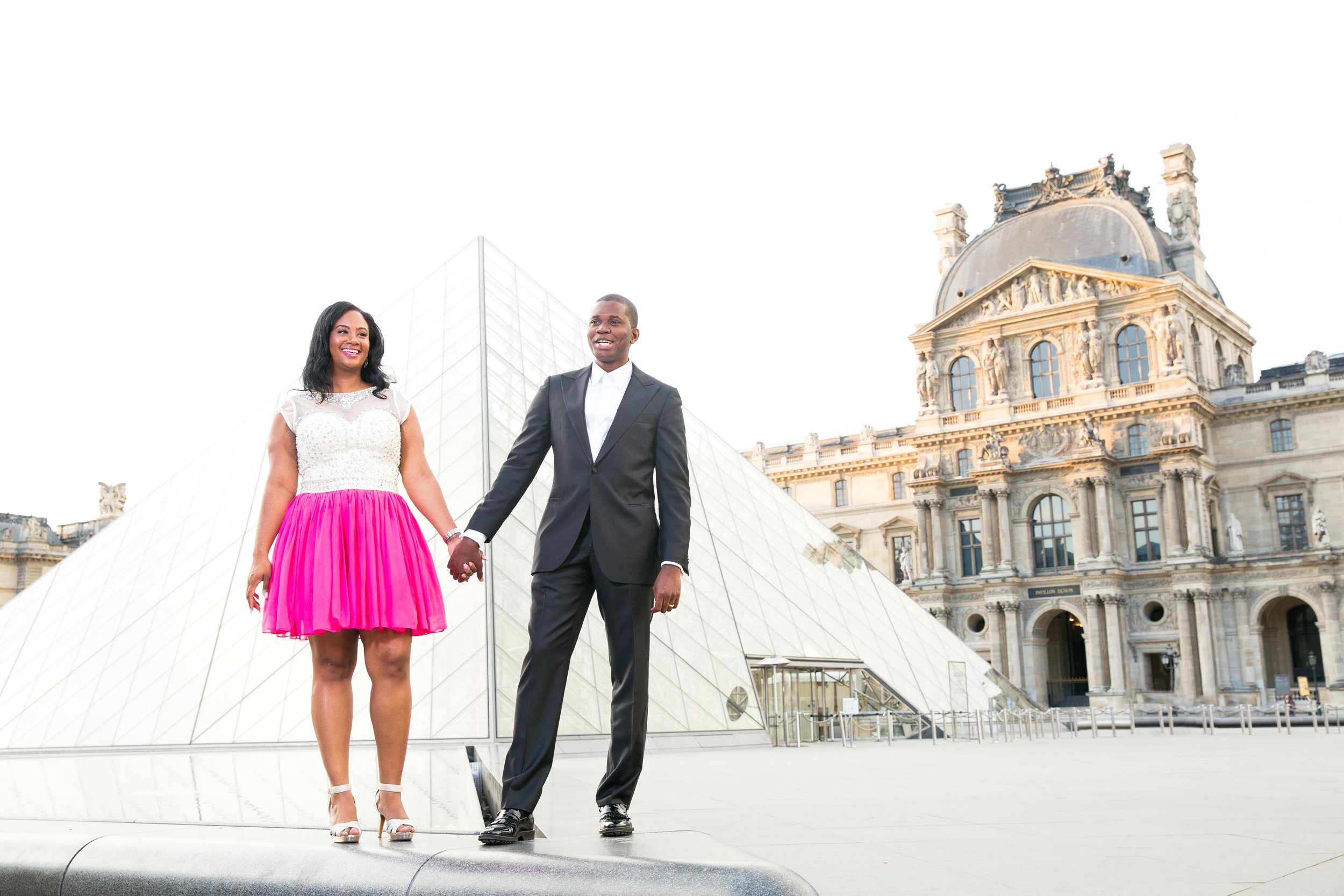  couple-hand-in-hand-alone-at-the-louvre 