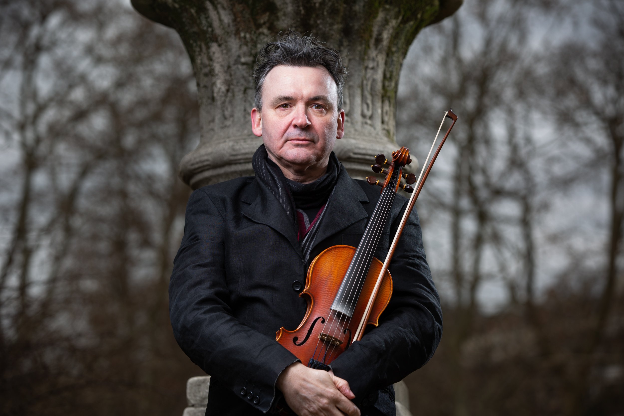  nick pynn posing with violin 