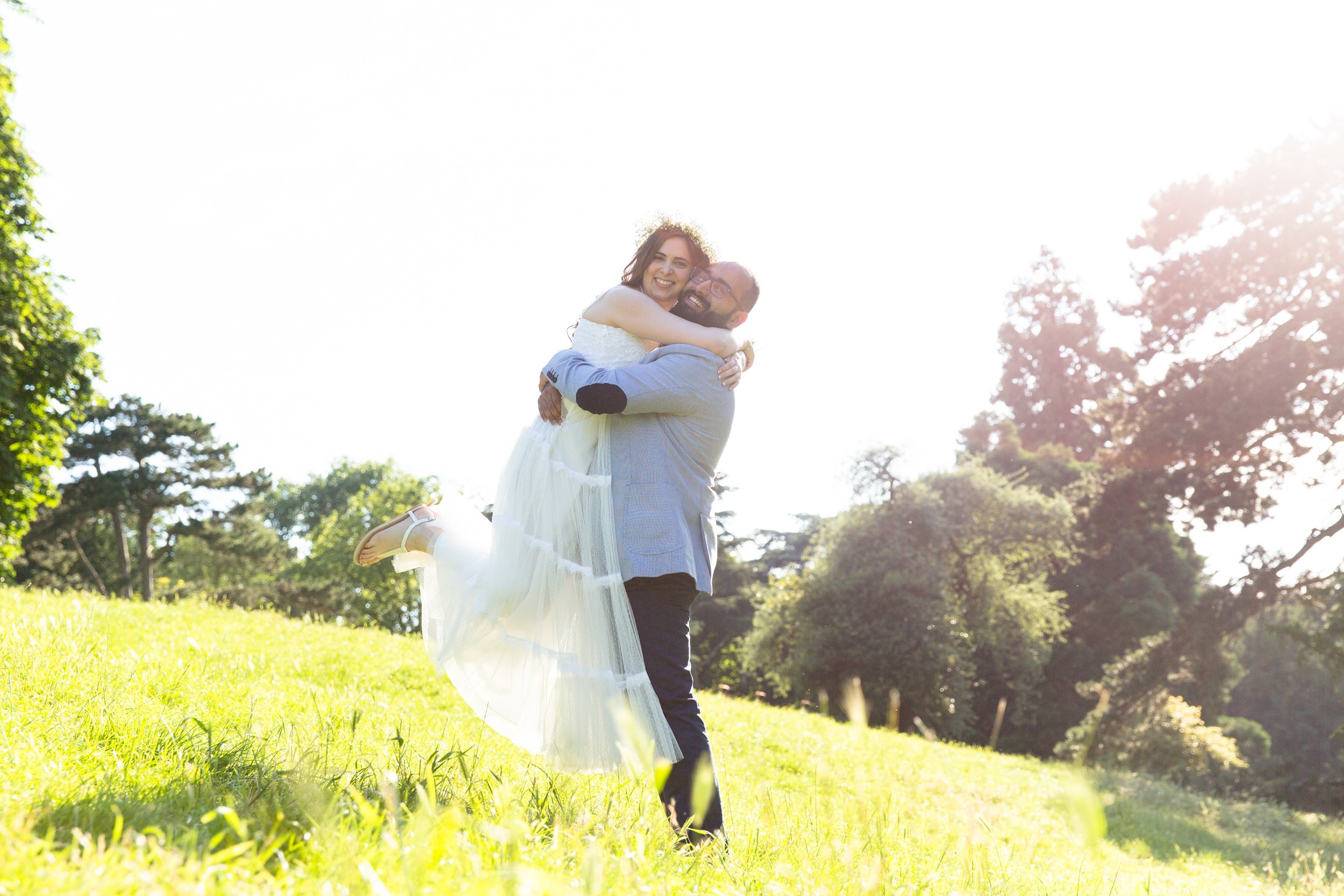  private-pre-wedding-moment-with-groom-holding-bride 