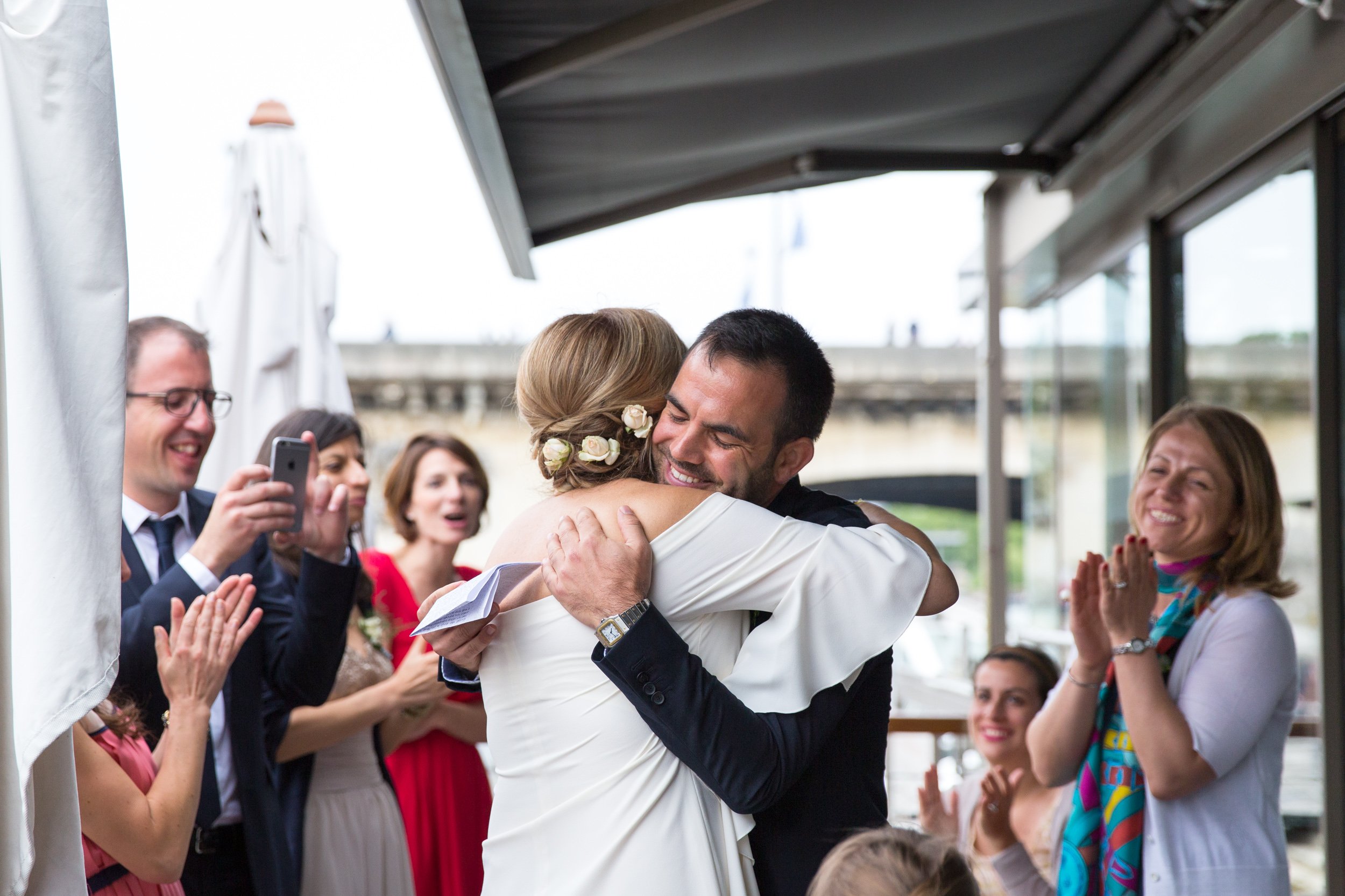  newly-weds-embrace-after-wedding-speech 