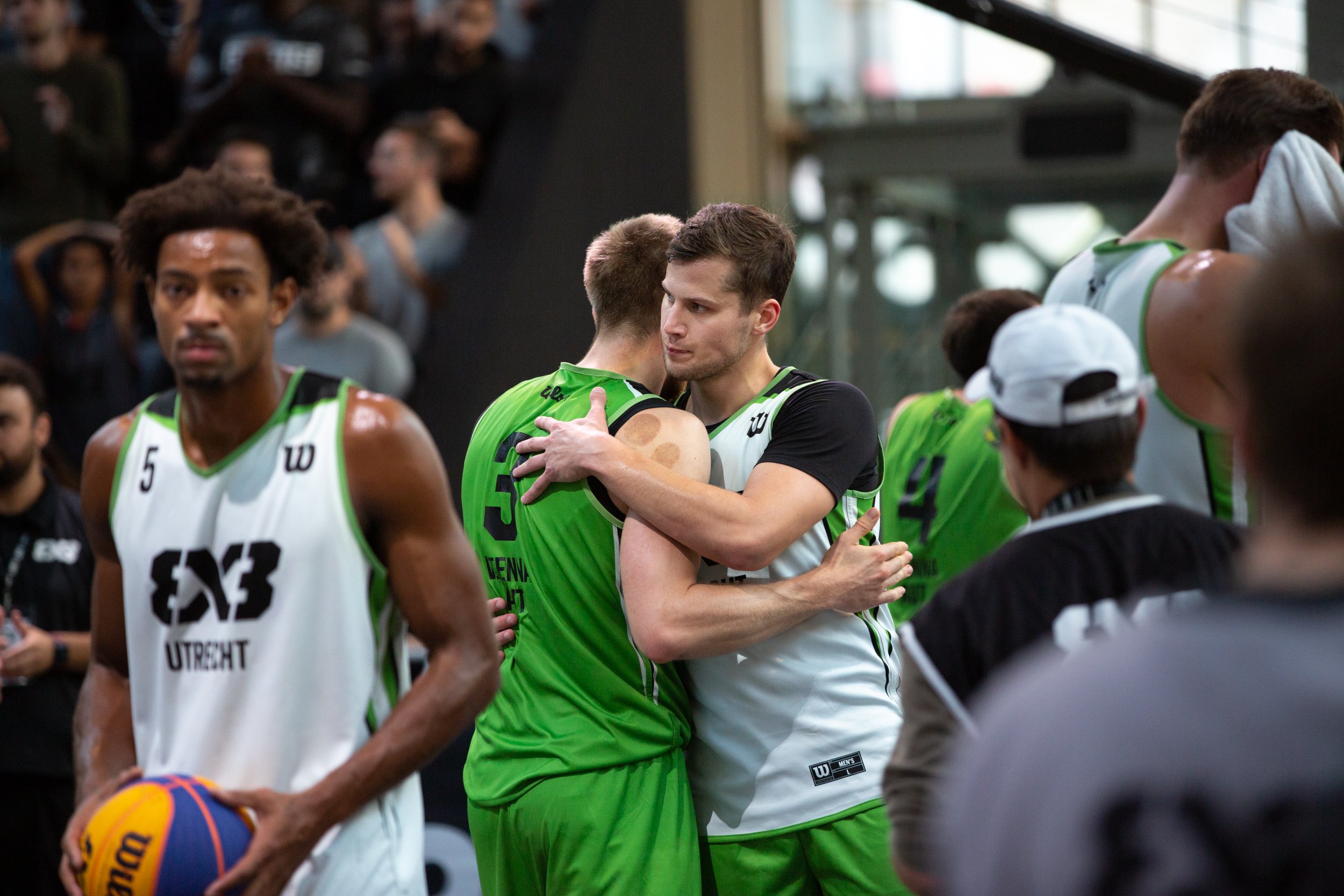  professional-basketballers-embrace 