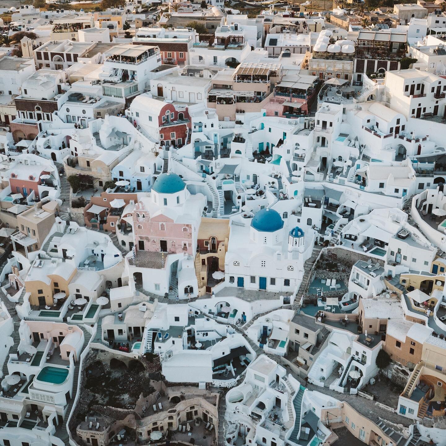 The picturesque town of Oia, Santorini from a bird's eye view 🕊️#Santorini #Greece #IslandLife #Travel #Wanderlust #DroneShot #AerialPhotography #BeautifulDestinations #ExploreTheWorld #BucketList #VacationGoals #TravelGram #Nature #SunsetLover #Par