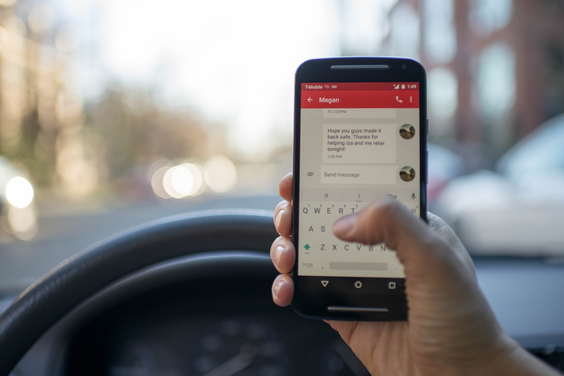 Driving whilst using a hand-held mobile phone 