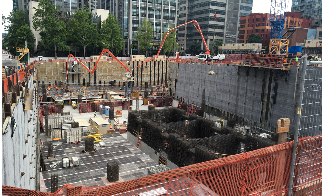 A full city block is being developed on the former Greyhound Bus Terminal, as shown here from the corner of 8th St. & Olive Wy. When complete, this project by RC Hedreen Co., will be one of the largest hotels on the West Coast.