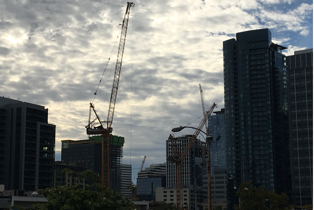A flock of tower cranes have descended upon downtown Seattle with a record number of construction projects in motion.