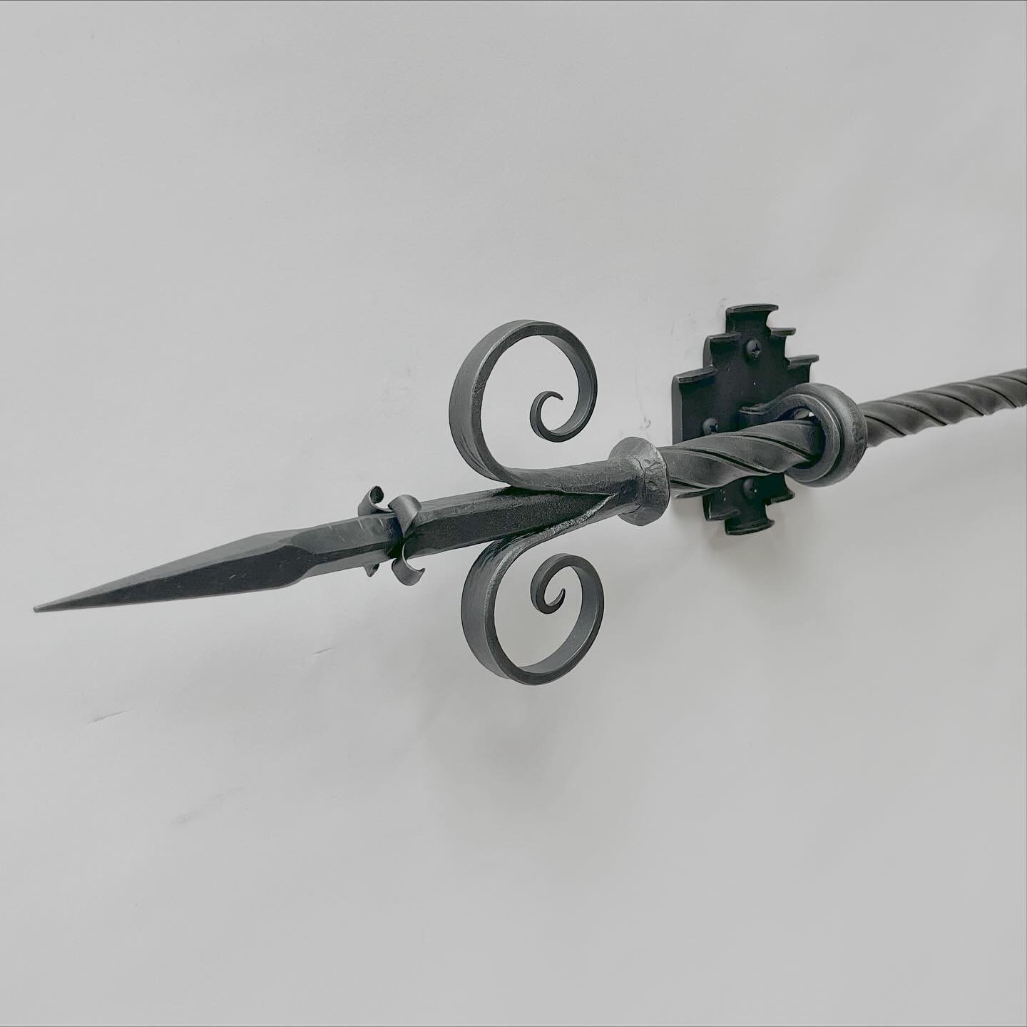 A tapestry hanging bar we recently completed in low carbon steel. A wonderful presence and lots of detail without being over the top. Difficult to photograph because of the long narrow shape. A pretty special piece for a client&rsquo;s family heirloo