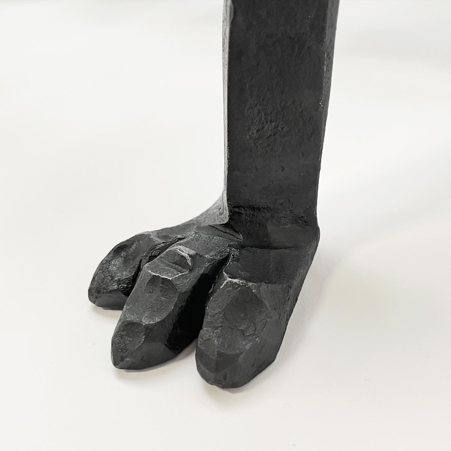 Detail of Animal Foot on a Log Rack made by  Smith Shop in 2025.