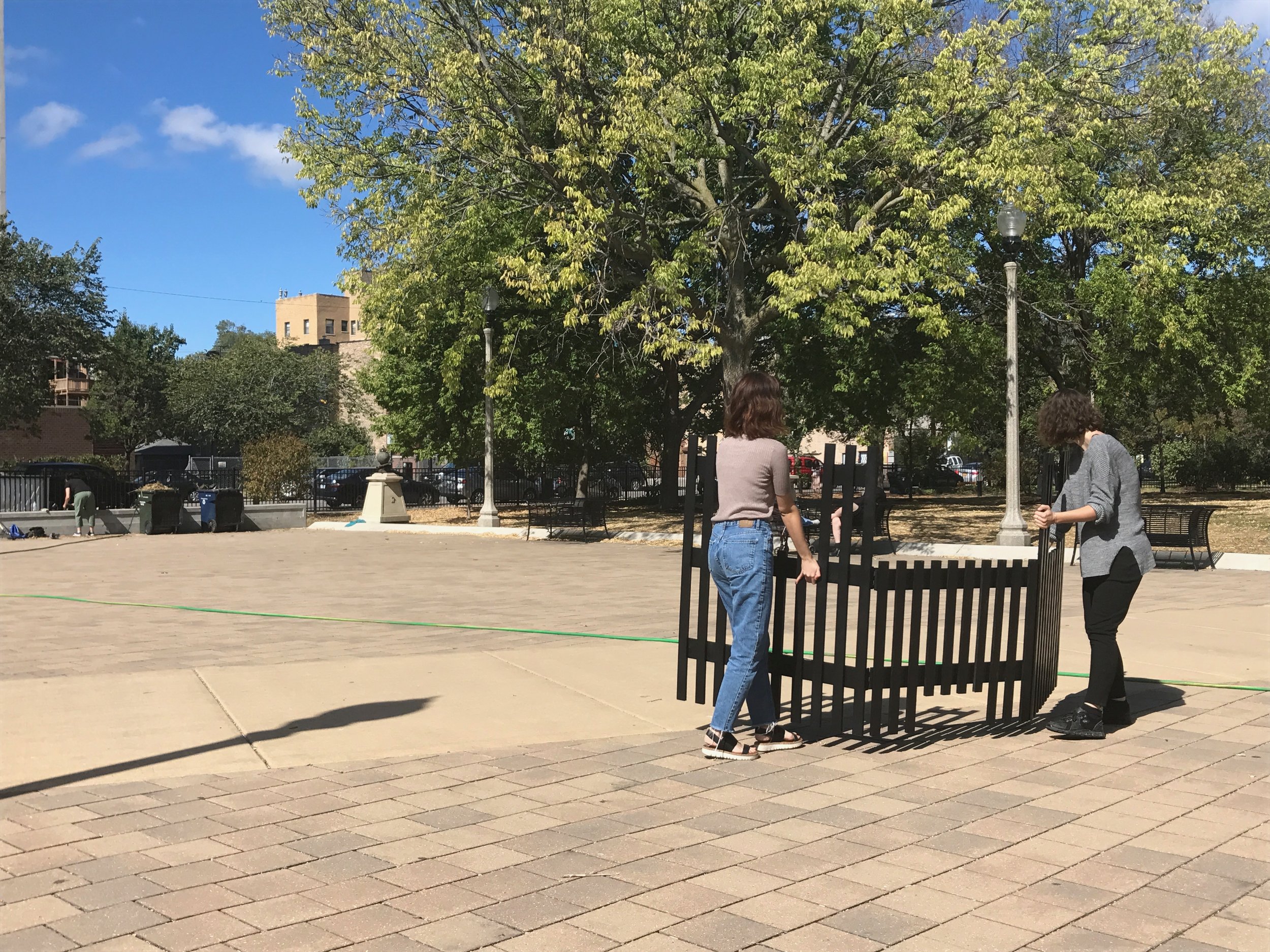  As a part of Terrain Biennial, a public art festival with locations throughout Chicago and the country, I held a durational performance in which I invited patrons of Buttercup Park to move with a fence that I constructed specifically for the park. D