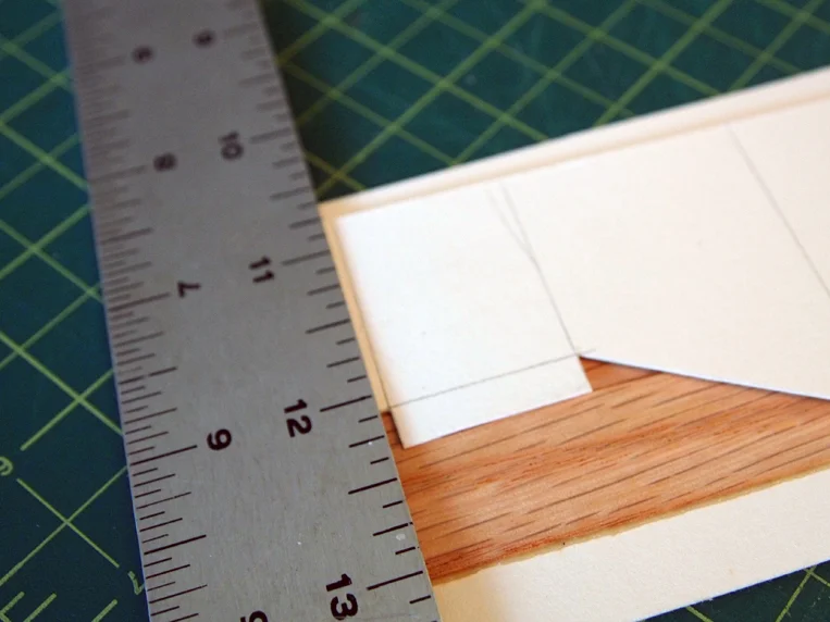 Incorrect, with ruler only covering the sliver being cut off.
