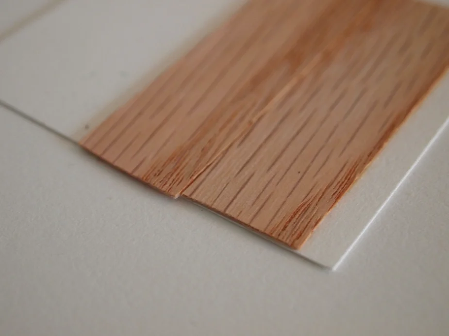 Side by side veneer, on the OPPOSITE side the veneer lays perpendicular