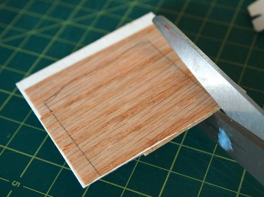 Using scissors to cut out porch
