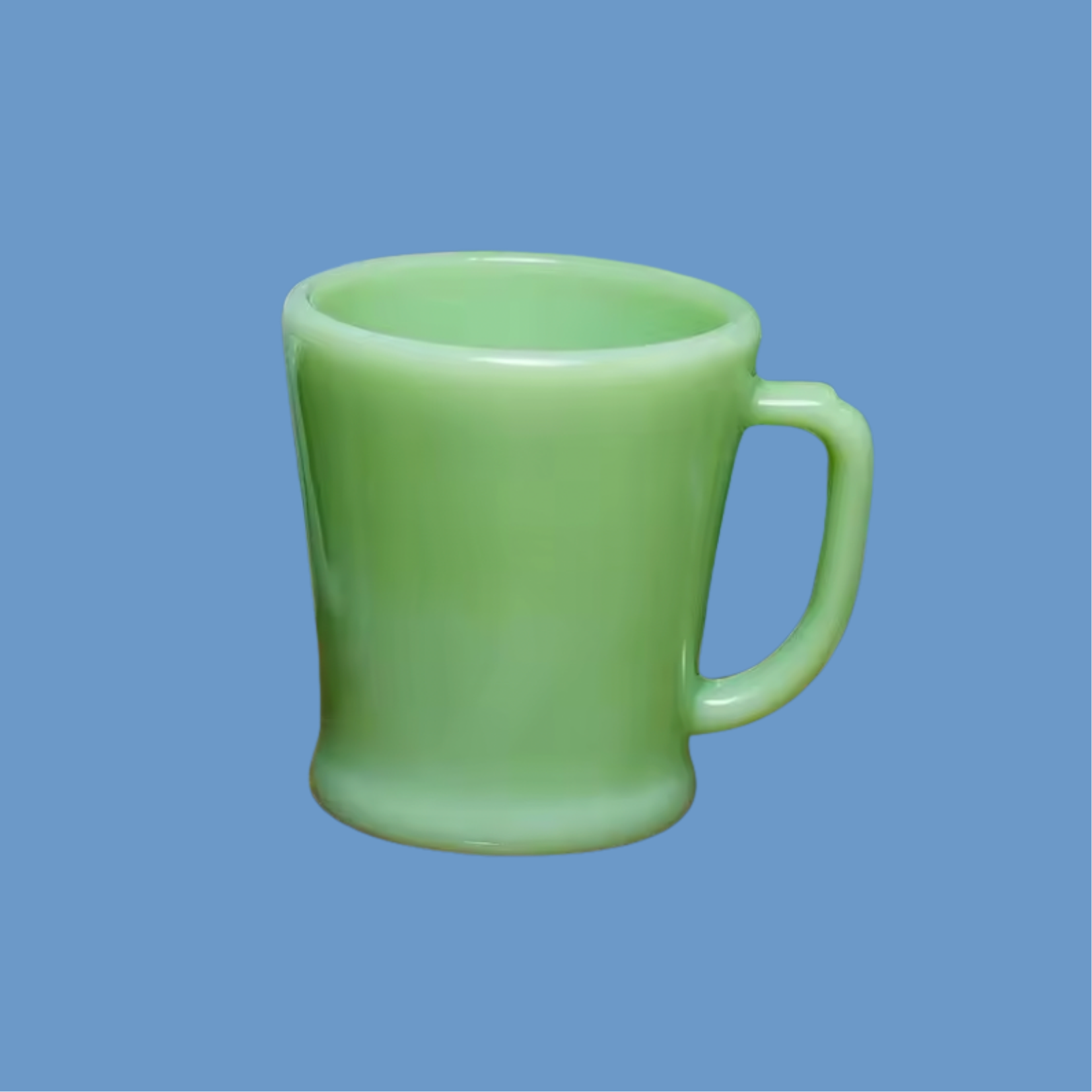2 green jade milk glass mug on a blue background.png