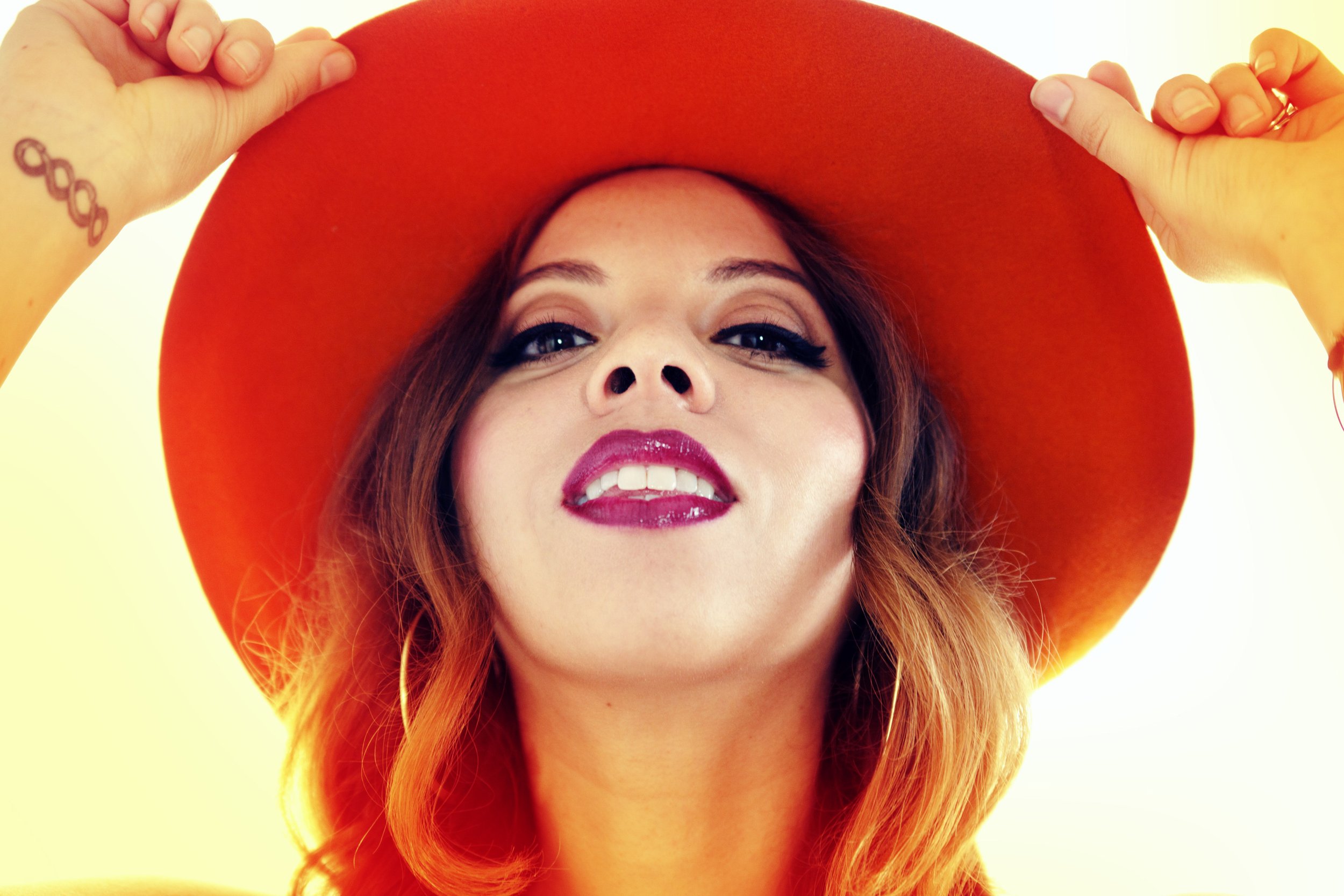 Crystal Torres - Crystal the Indigo - Orange Hat - Headshot - 1200px.jpg