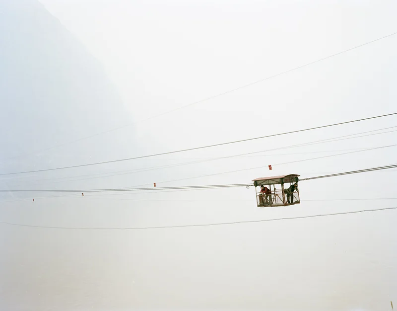 People in a Cable Car, Xiaxi, 2011