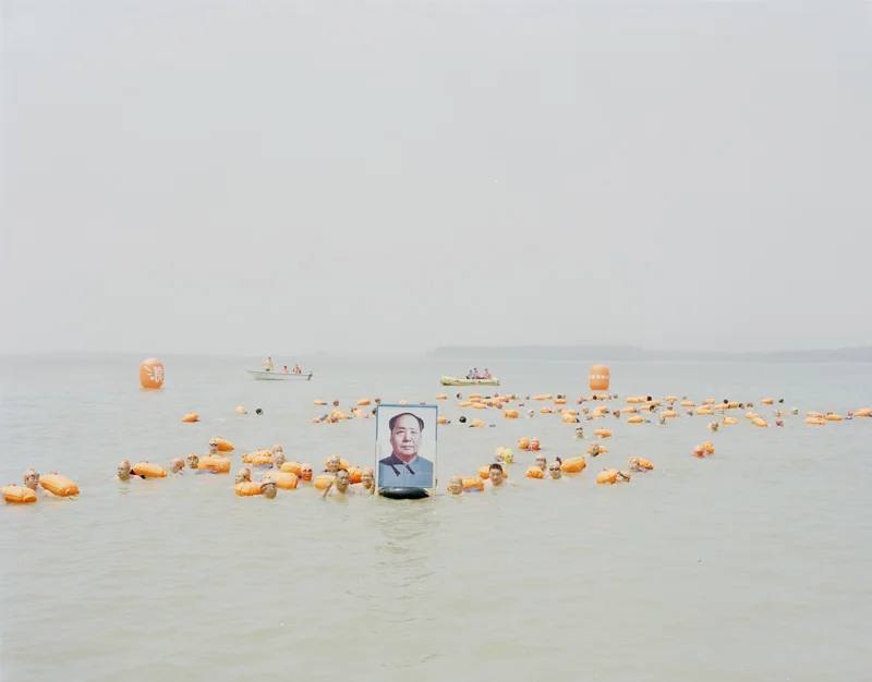 People Holding a Picture of Mao Zedong Across the Yellow River, Henan, 2012