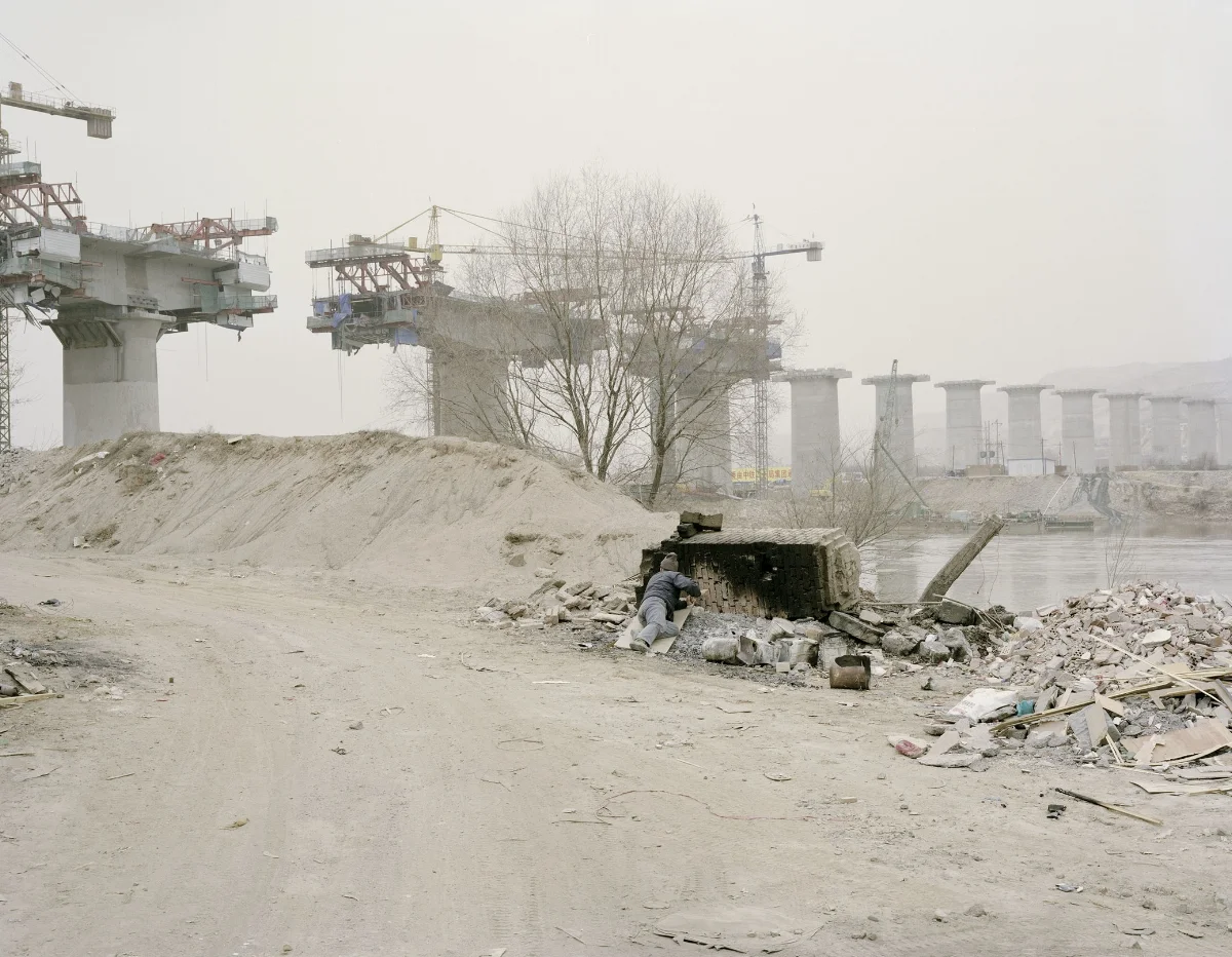 Workers Taking Midday Rest beside a Bridge, Gansu, 2010