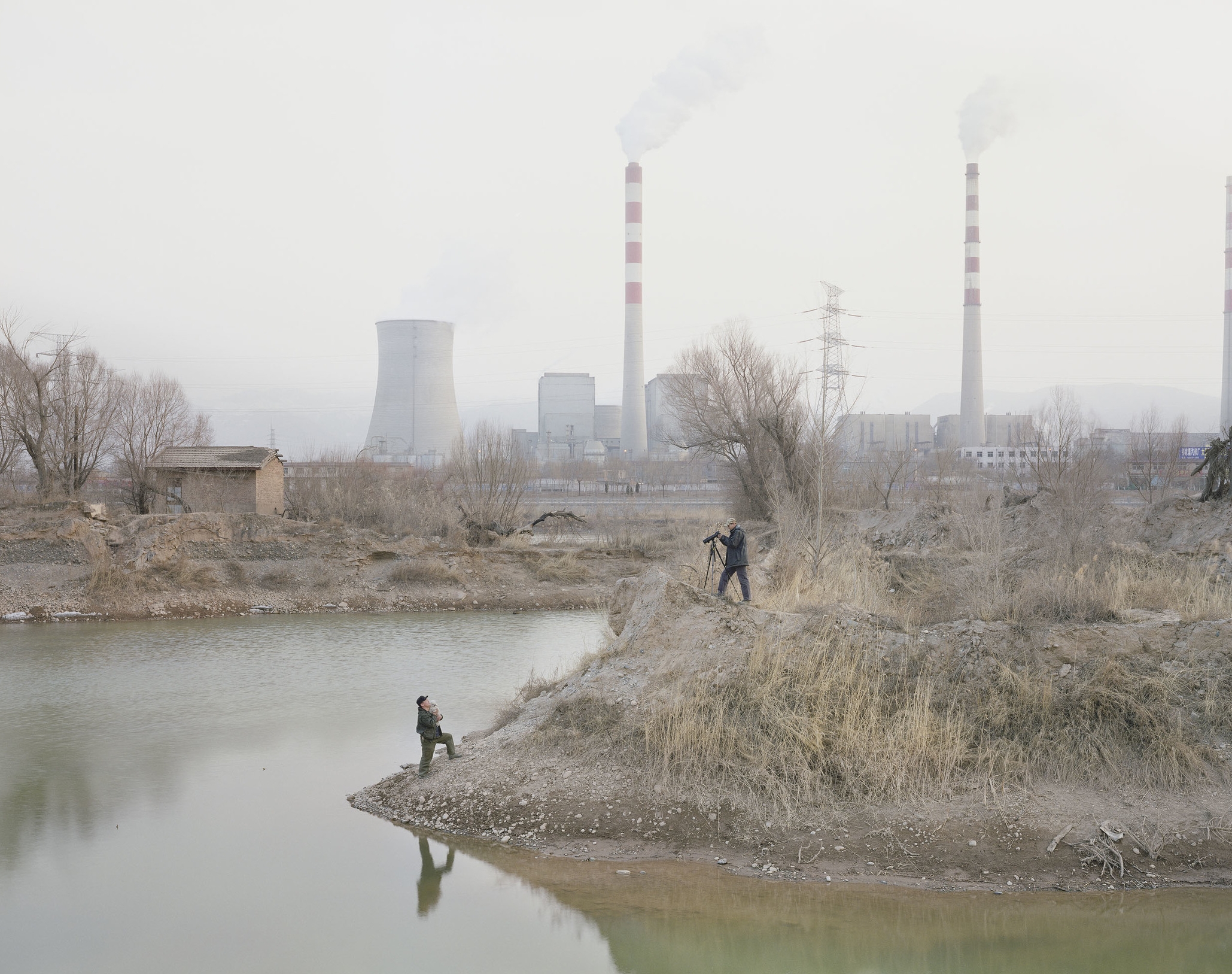 Two Men Taking Photos by the River, Gansu, 2010
