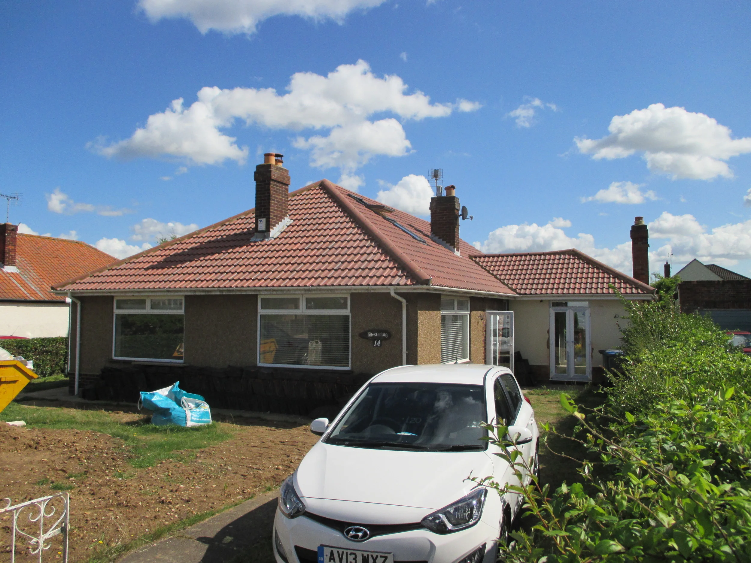 Conversion in Progress - Front / West & South Elevations
