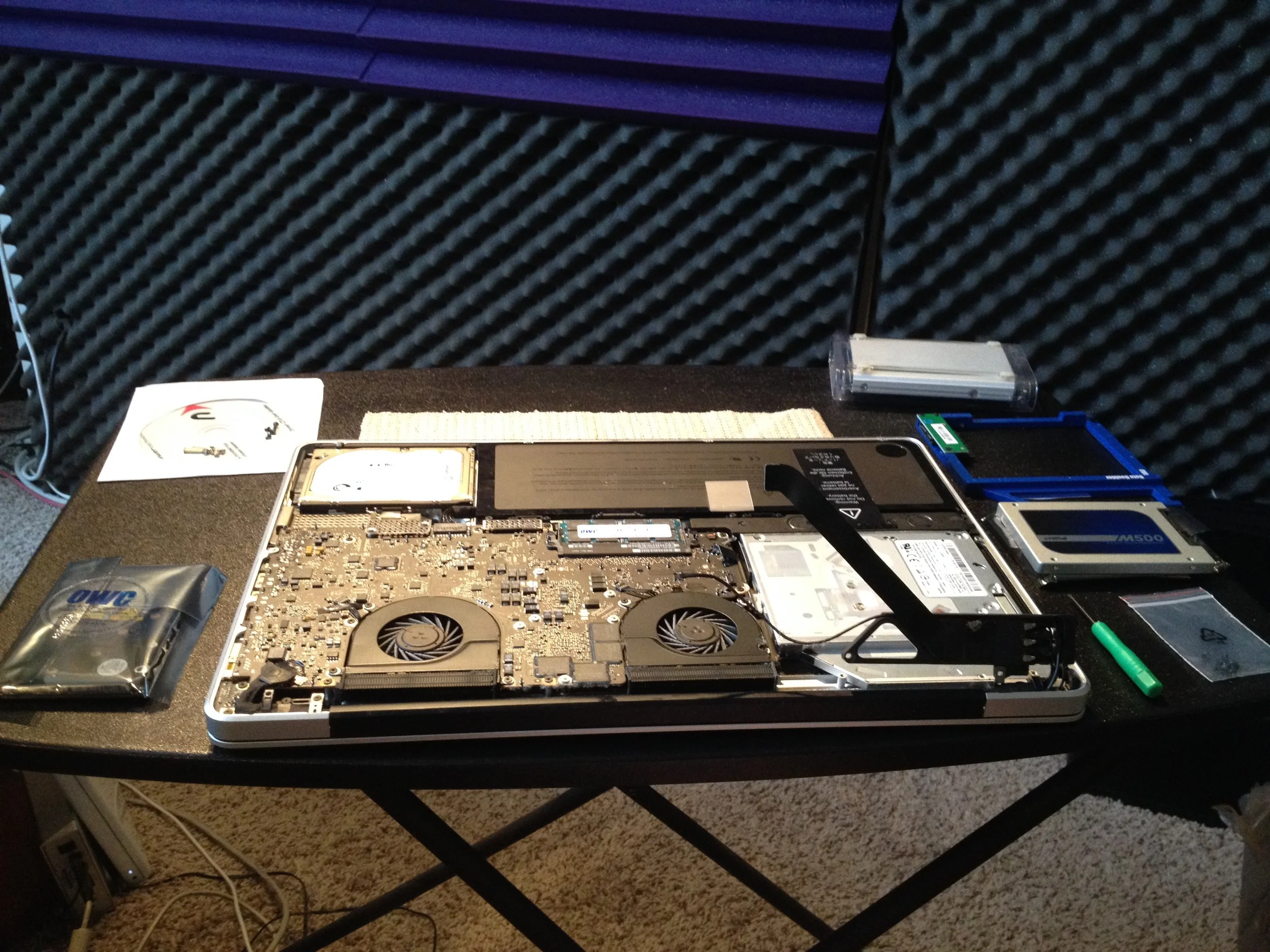 Laptop upside down, bottom removed and ready for the upgrade
