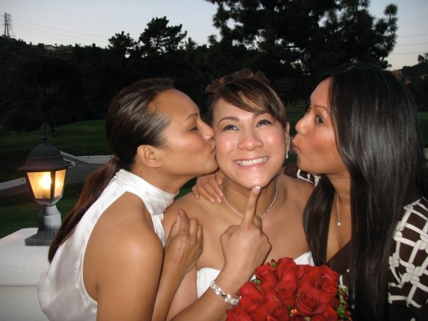 Wedding kiss sisters.jpg