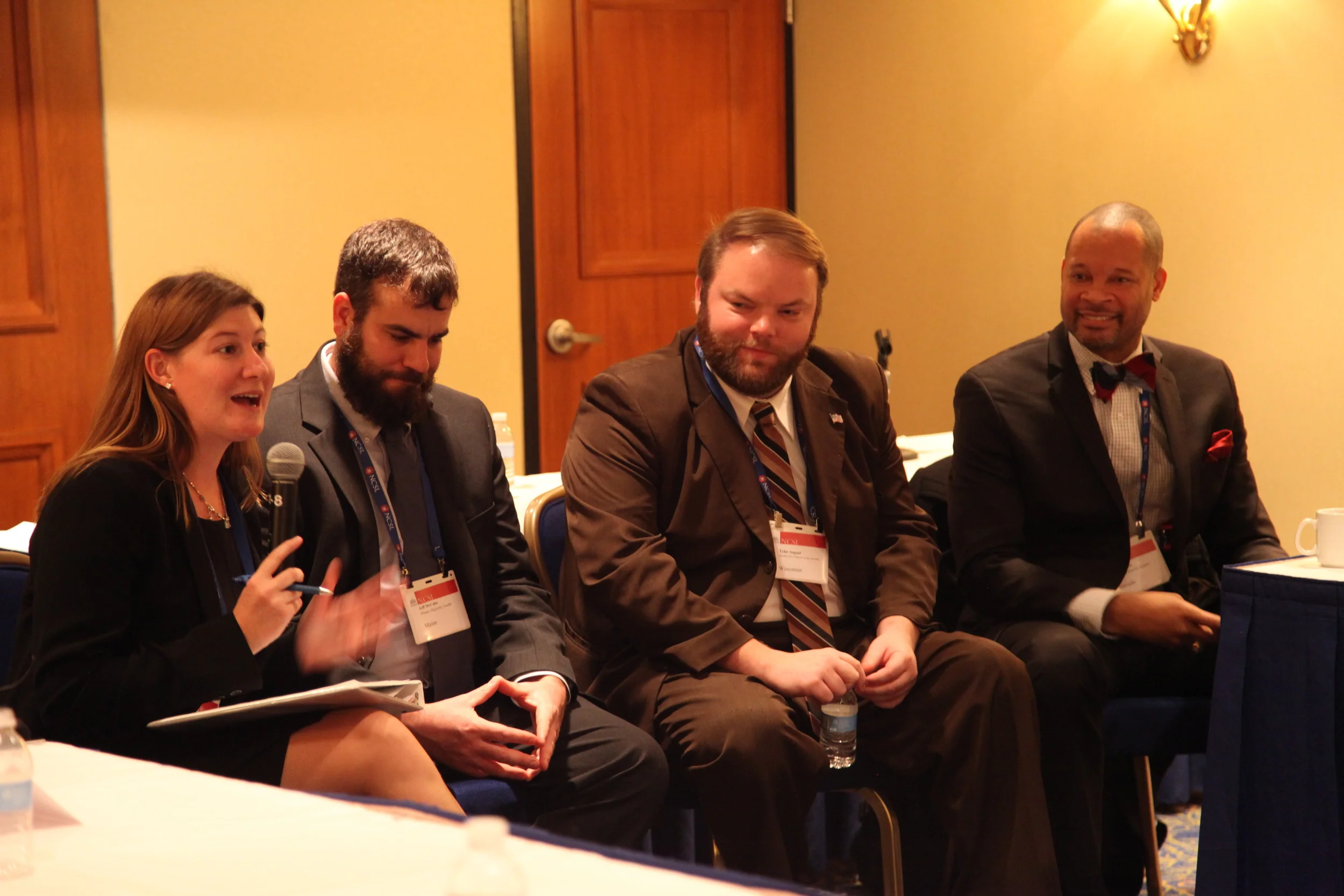 L-R: Stacy Householder, Representative Jeff McCabe (D-ME), Representative Tyler August (R-WI), and Senator Aaron Ford (D-NV)